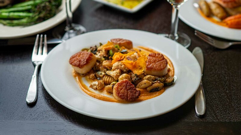 Crab cake entree with sweet potato sauce